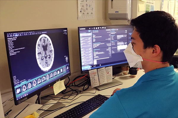 A computer screen with a PACS and RIS interface