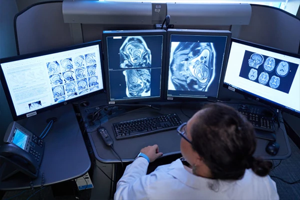 An emergency room scene or a clock with an alert symbol